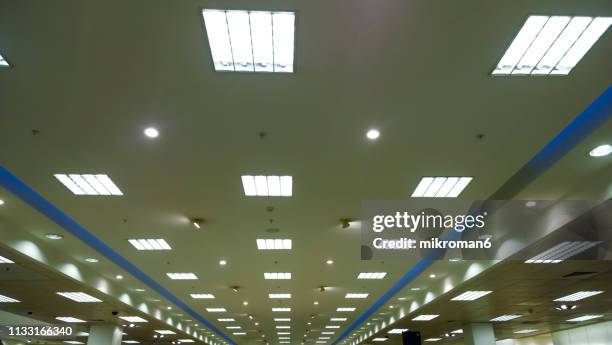 lights in building - ceiling light stockfoto's en -beelden