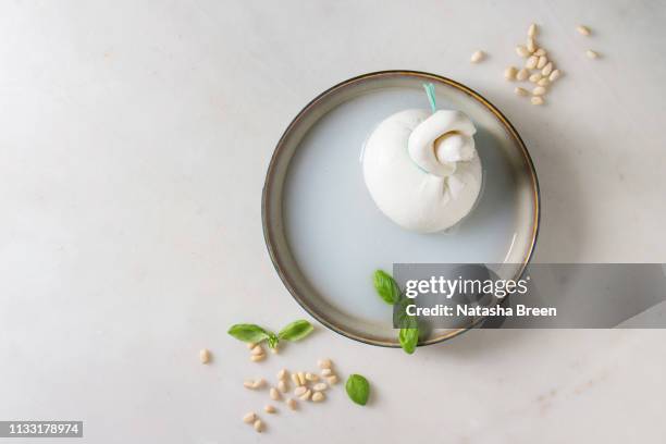 italian cheese burrata - burrata stock pictures, royalty-free photos & images