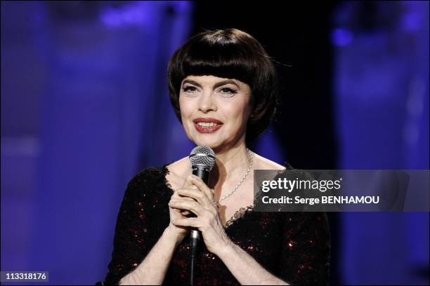 Mireille Mathieu And Tina Arena On The 100 Th Christmas Of 'Les Petits Chanteurs A La Croix De Bois' Tv Show In Paris, France On December 04, 2006 -...