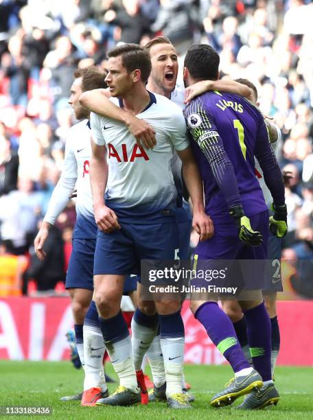 Hugo Lloris of Tottenham Hotspur celebrates with teammates after saving a penalty during the Premier League match between Tottenham Hotspur and...