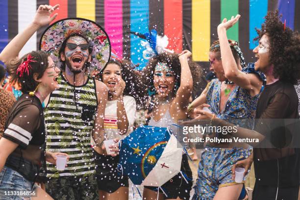 people celebrating carnival - fiesta stock pictures, royalty-free photos & images