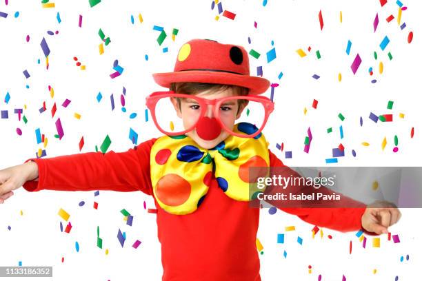 happy clown with confetti falling over him - happy clown faces stock-fotos und bilder