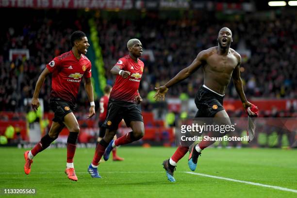 Romelu Lukaku of Manchester United celebrates after scoring his team's third goal during the Premier League match between Manchester United and...