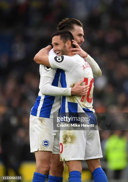 Florin Andone of Brighton and Hove Albion celebrates after scoring his team's first goal with teammate Davy Proepper during the Premier League match...