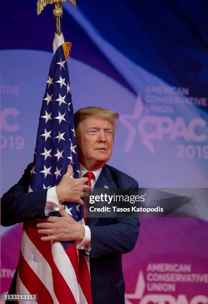 Hugging Flag Trump Hugging Flag Photos and Premium High Res Pictures - Getty Images