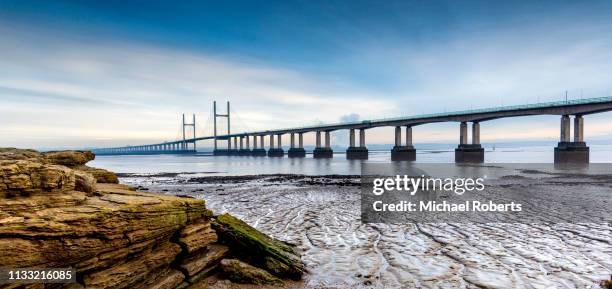 the prince of wales bridge, or second severn crossing, spanning the severn estuary and river wye between wales and england - severn river 個照片及圖片檔