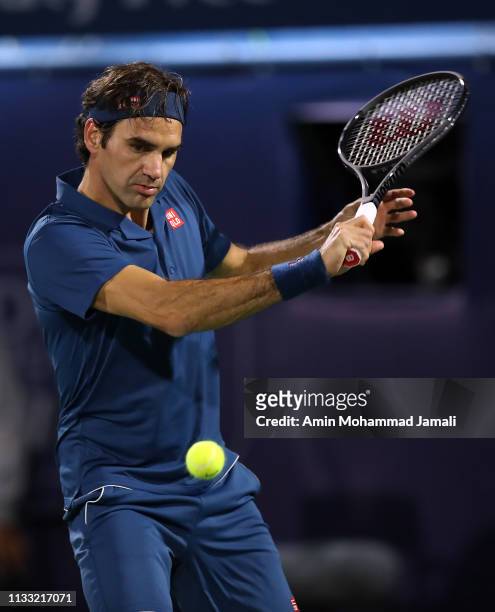 Roger Federer of Switzerland in action against Stefanos Tsitsipas of Greece during day Fourteen of the Dubai Duty Free Tennis Stadium on at Dubai...