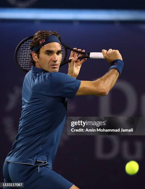 Roger Federer of Switzerland in action against Stefanos Tsitsipas of Greece during day Fourteen of the Dubai Duty Free Tennis Stadium on at Dubai...