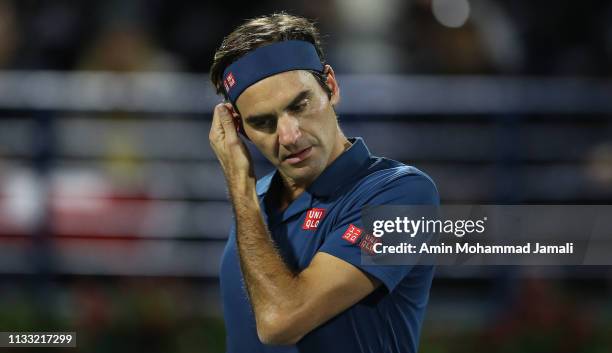 Roger Federer of Switzerland react against Stefanos Tsitsipas of Greece during day Fourteen of the Dubai Duty Free Tennis Stadium on at Dubai Duty...