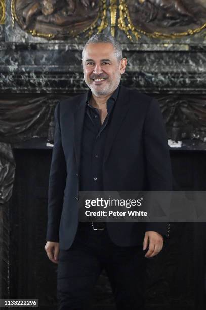 Fashion designer Elie Saab walks the runway during the finale of Elie Saab show as part of the Paris Fashion Week Womenswear Fall/Winter 2019/2020 on...
