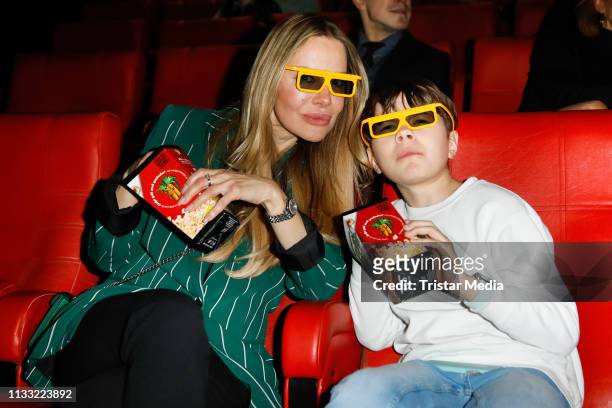 Xenia Seeberg and her son Philip-Elias Martinek attend the premiere of the film LEGO City "Cops In Action" at LEGOLAND Discovery Center Berlin on...