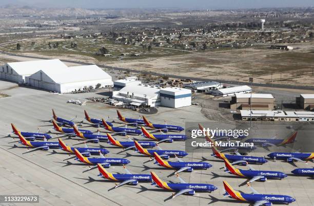 Number of Southwest Airlines Boeing 737 MAX aircraft are parked at Southern California Logistics Airport on March 27, 2019 in Victorville,...