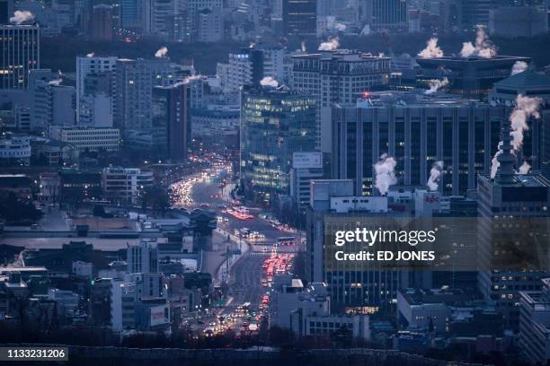 Photo taken on January 12, 2018 shows a general view of the Seoul city skyline. - Spycam crimes have become so prevalent in South Korea that female...