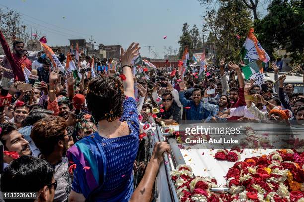 Congress Party's Priyanka Gandhi's waves to the crowd during her campaigns on March 27 in Uttar Pradesh, India. Congress leader Priyanka Gandhi...