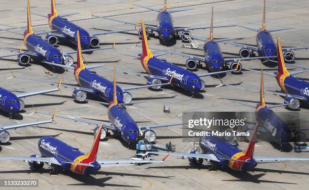 Number of Southwest Airlines Boeing 737 MAX aircraft are parked at Southern California Logistics Airport on March 27, 2019 in Victorville,...