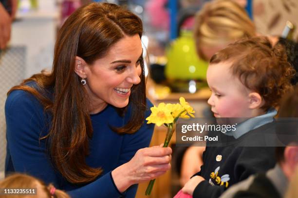 Catherine, Duchess of Cambridge meets service users during a visit St Joseph’s SureStart Facility on February 28, 2019 in Ballymena, Northern...