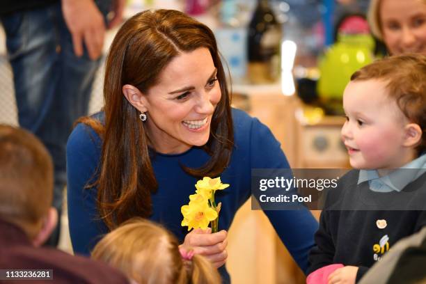 Catherine, Duchess of Cambridge meets service users during a visit St Joseph’s SureStart Facility on February 28, 2019 in Ballymena, Northern...