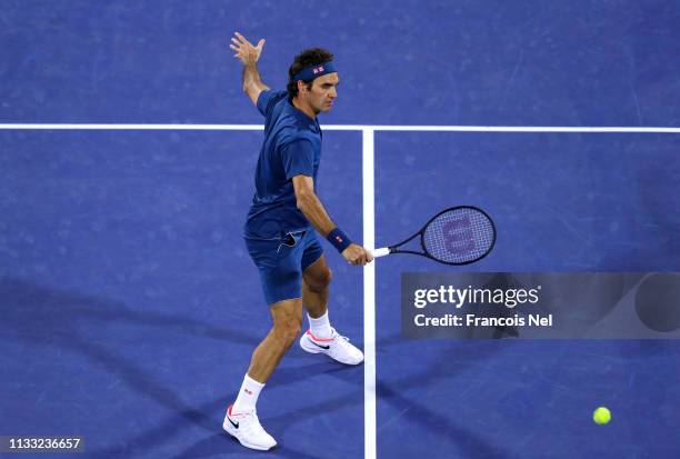 Roger Federer of Switzerland plays a shot in his Men's Singles Final match against Stefanos Tsitsipas of Greece during day fourteen of the Dubai Duty...