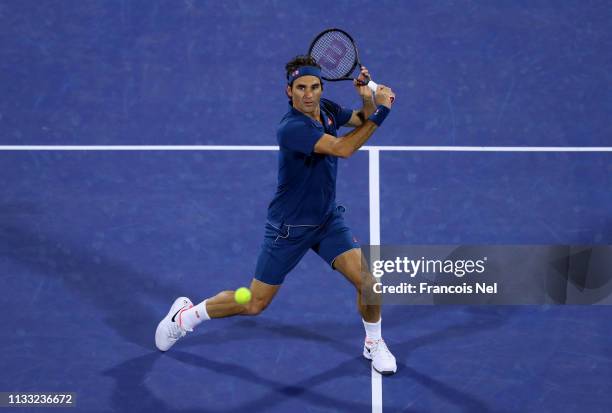 Roger Federer of Switzerland plays a shot in his Men's Singles Final match against Stefanos Tsitsipas of Greece during day fourteen of the Dubai Duty...
