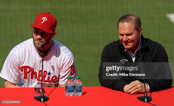 Bryce Harper is introduced to the Philadelphia Phillies with agent Scott Boras during a press conference at Spectrum Stadium on March 02, 2019 in...