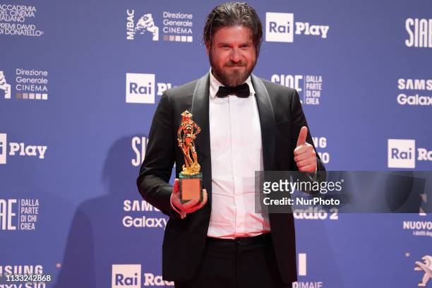 Edoardo Pesce wins the award for best supporting actor of the 64. David Di Donatello awards ceremony - Red Carpet on March 27, 2019 in Rome, Italy.