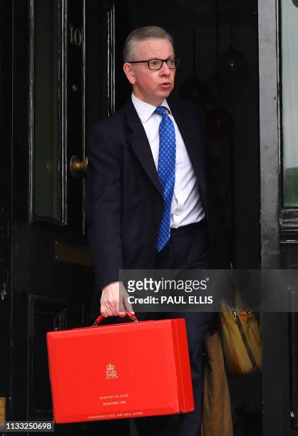 Britain's Environment, Food and Rural Affairs Secretary Michael Gove leaves his residence in west London on March 28, 2019.