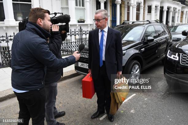 Britain's Environment, Food and Rural Affairs Secretary Michael Gove leaves his residence in west London on March 28, 2019.