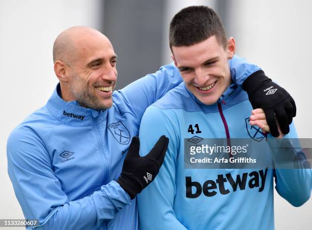 Pablo Zabaleta and Declan Rice of West Ham United during Training at Rush Green on March 28, 2019 in Romford, England.