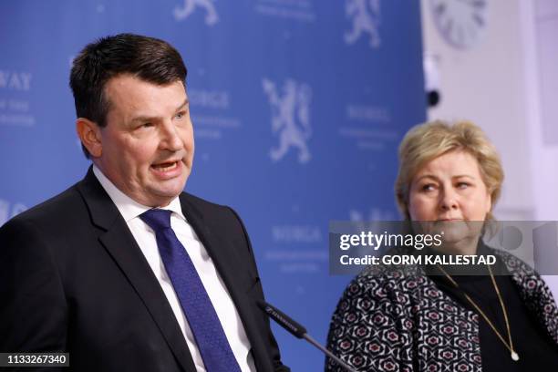 Norwegian Minister of Justice Tor Mikkel Wara and Norwegian Prime Minister Erna Solberg address a press conference in Oslo, Norway on March 28, 2019....