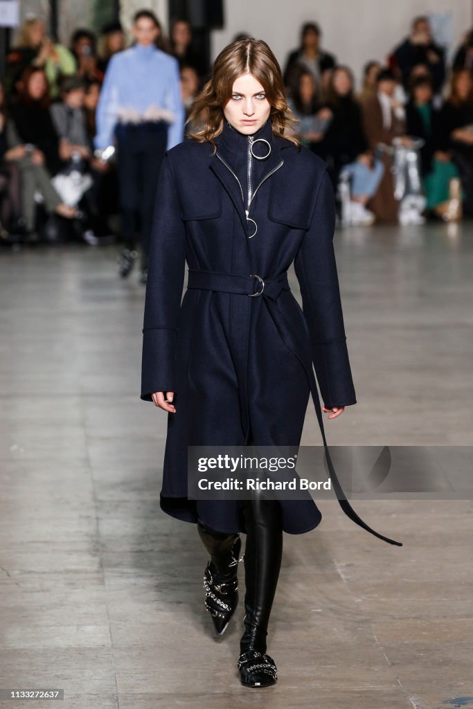 A model walks the runway during the Cedric Charlier show as part of ...