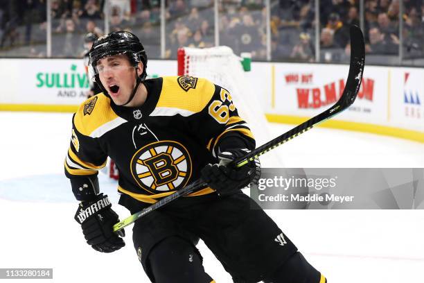Brad Marchand of the Boston Bruins reacts after his penalty shot on goal is saved by Mackenzie Blackwood of the New Jersey Devils during the first...