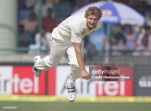 Australian cricketer Shane Watson bowls during the first day of the third Test match between Australia and India at Feroz Shah Kotla ground, on...