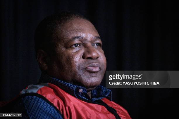 Mozambique's President Filipe Nyusi looks on during a meeting with businessmen from different sectors in Beira, Mozambique, on March 27, 2019.