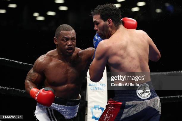 Edwin Rodriguez echanges punches with Mitch Williams during their cruiserweight fight at Barclays Center on March 02, 2019 in New York City.