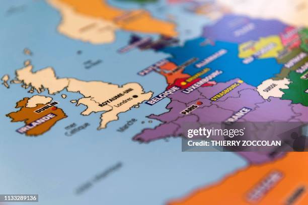 Maps featuring the European Union without Britain, as part of the Brexit deal, are printed by Aedis publishing house in Lempdes on March 28, 2019.