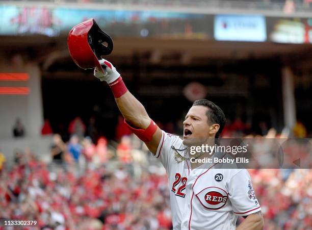 Derek Dietrich of the Cincinnati Reds celebrates after hitting a three run home run during the seventh inning of the game against the Pittsburgh...