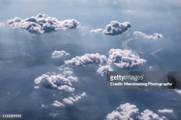 aerial shot of blue sky with clouds - aerial cloudscape stock pictures, royalty-free photos & images