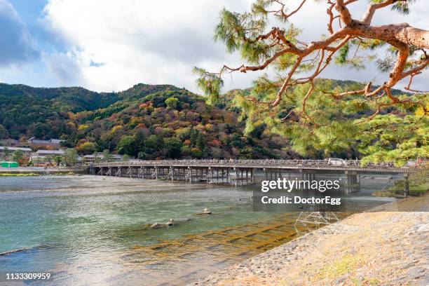 togetsukyo bridge in autumn, arashiyama, kyoto, japan - 渡月橋 ストックフォトと画像