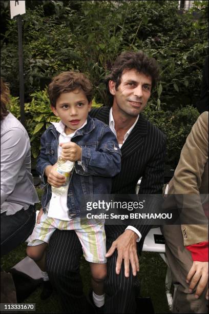 Celebs At Francesco Smalto Spring Summer 2006 Fashion Show - On July 4Th, 2005 - In Paris, France - Here, Frederic Taddei And His Son Diego