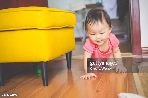 asian baby - baby climbing stock pictures, royalty-free photos & images