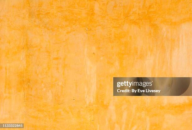 yellow painted wall texture - spanish culture 個照片及圖片檔