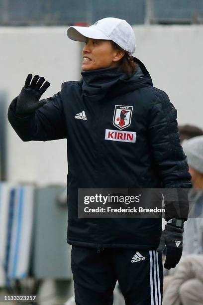 Head coach Asako Takakura of Japan coaches during the 2019 SheBelieves Cup match between Brazil and Japan at Nissan Stadium on March 2, 2019 in...