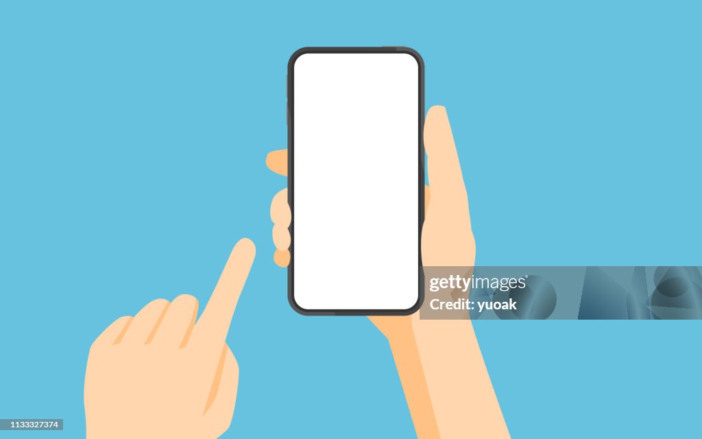 Hand holding smartphone and touching screen