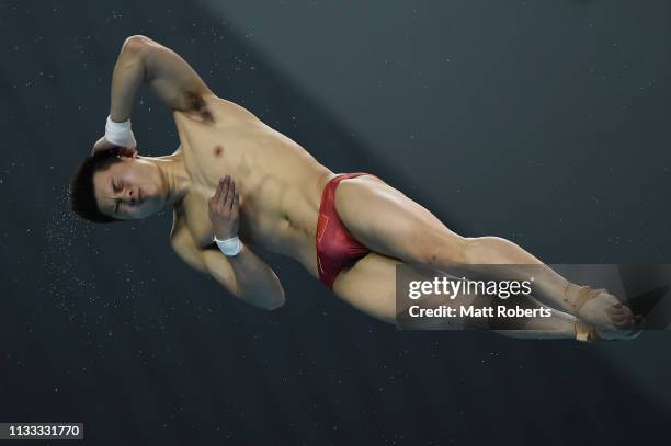 Aisen Chen of China competes during the Men's 10m Platform Final on day three of the FINA Diving World Cup Sagamihara at Sagamihara Green Pool on...