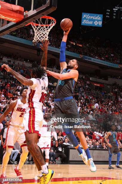 Salah Mejri of the Dallas Mavericks goes up for dunk against the Miami Heat on March 28, 2019 at American Airlines Arena in Miami, Florida. NOTE TO...