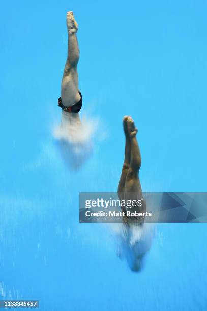 Lou Massenberg and Tina Punzel of Germany compete during the Mixed 3m Synchro Springboard Final on day three of the FINA Diving World Cup Sagamihara...