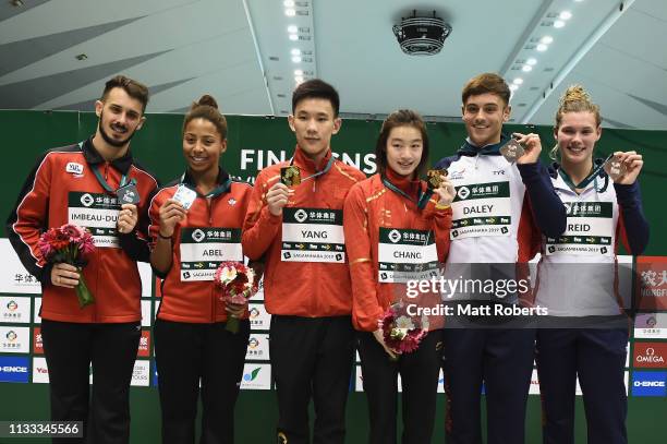 Silver medalist Jennifer Abel and Francois Imbeau-Dulac of Canada, gold medalist Hao Yang and Yani Chang of China and bronze medalist Thomas Daley...