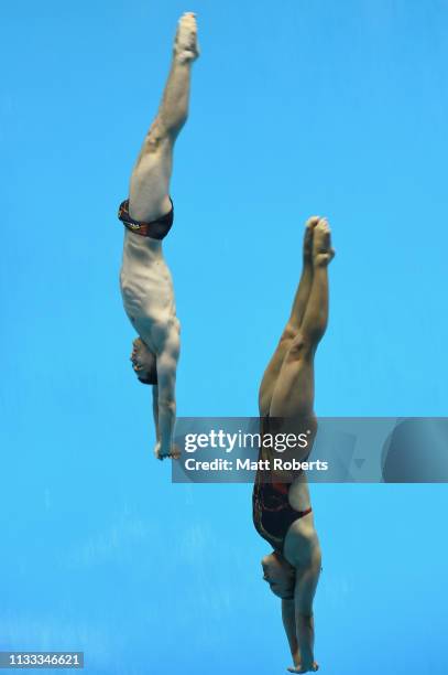 Lou Massenberg and Tina Punzel of Germany compete during the Mixed 3m Synchro Springboard Final on day three of the FINA Diving World Cup Sagamihara...