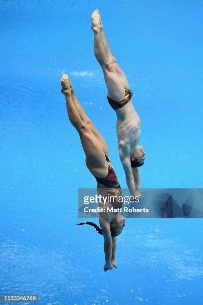Lou Massenberg and Tina Punzel of Germany compete during the Mixed 3m Synchro Springboard Final on day three of the FINA Diving World Cup Sagamihara...