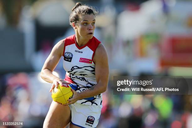 Ellie Blackburn of the Bulldogs looks to pass the ball during the round five AFLW match between the Fremantle Dockers and the Western Bulldogs at...